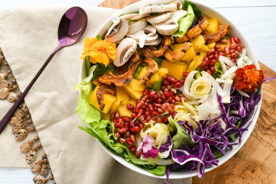 ENSALADA CON MANGO, GRANADA Y FRUTOS SECOS